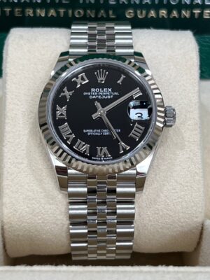 New Rolex date just 31 mm.