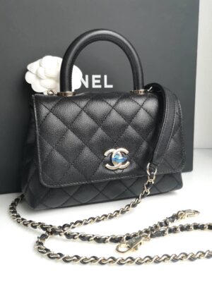 Used like new Chanel Coco 7.5 black caviar light gold hardware microchip plate