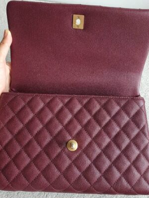 Used in very good condition Chanel coco 10.5 burgundy lizard ghw holo 24